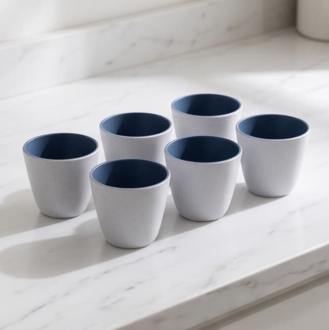 Blue and white ceramic bowl with a matte finish, size 7.5×7.5×7 cm, practical for daily use.